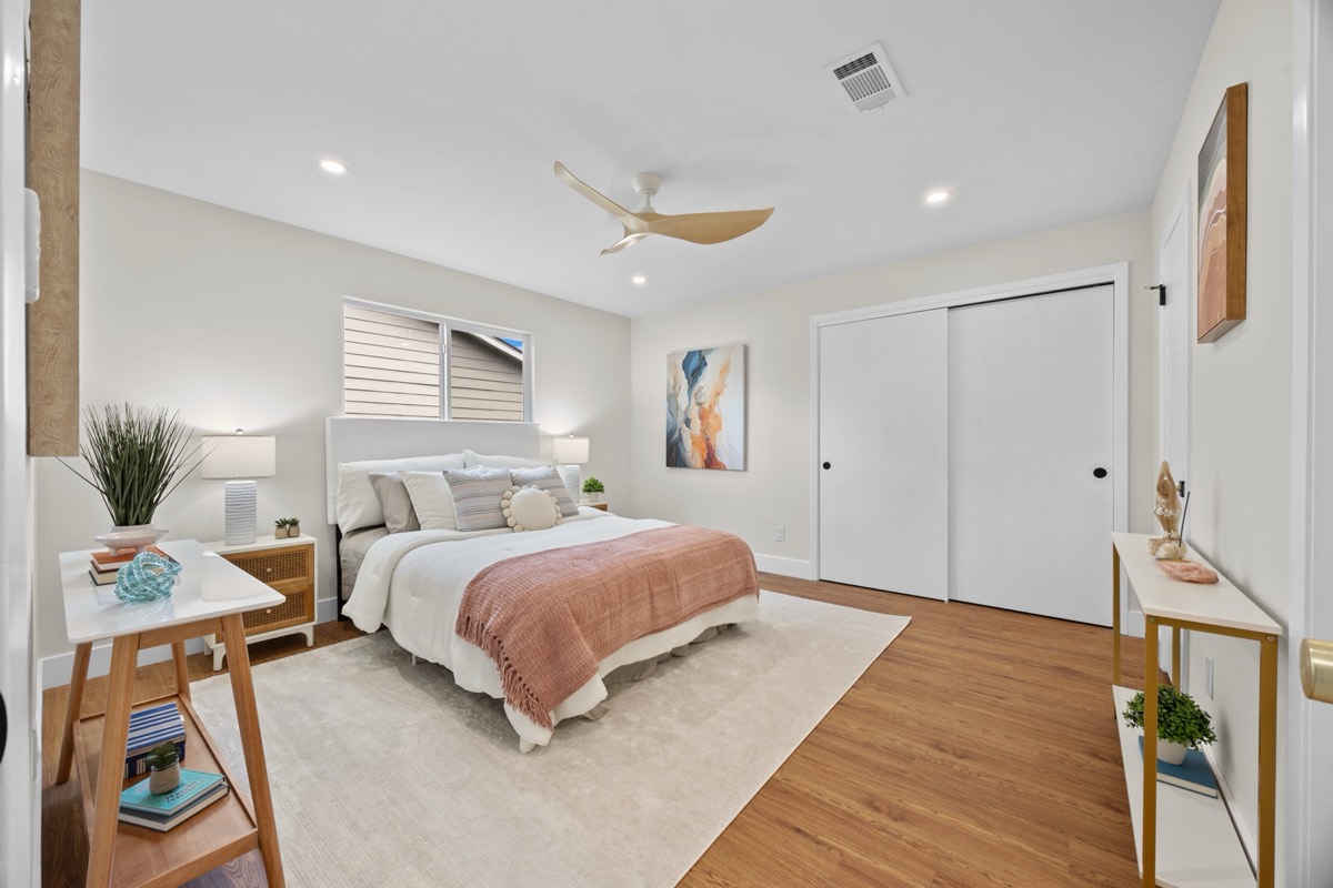 Staged bedroom with soft neutral tones